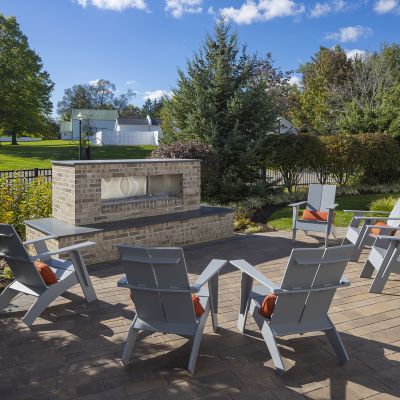 Unwind by the fireplace on the patio at the Westfield Inn